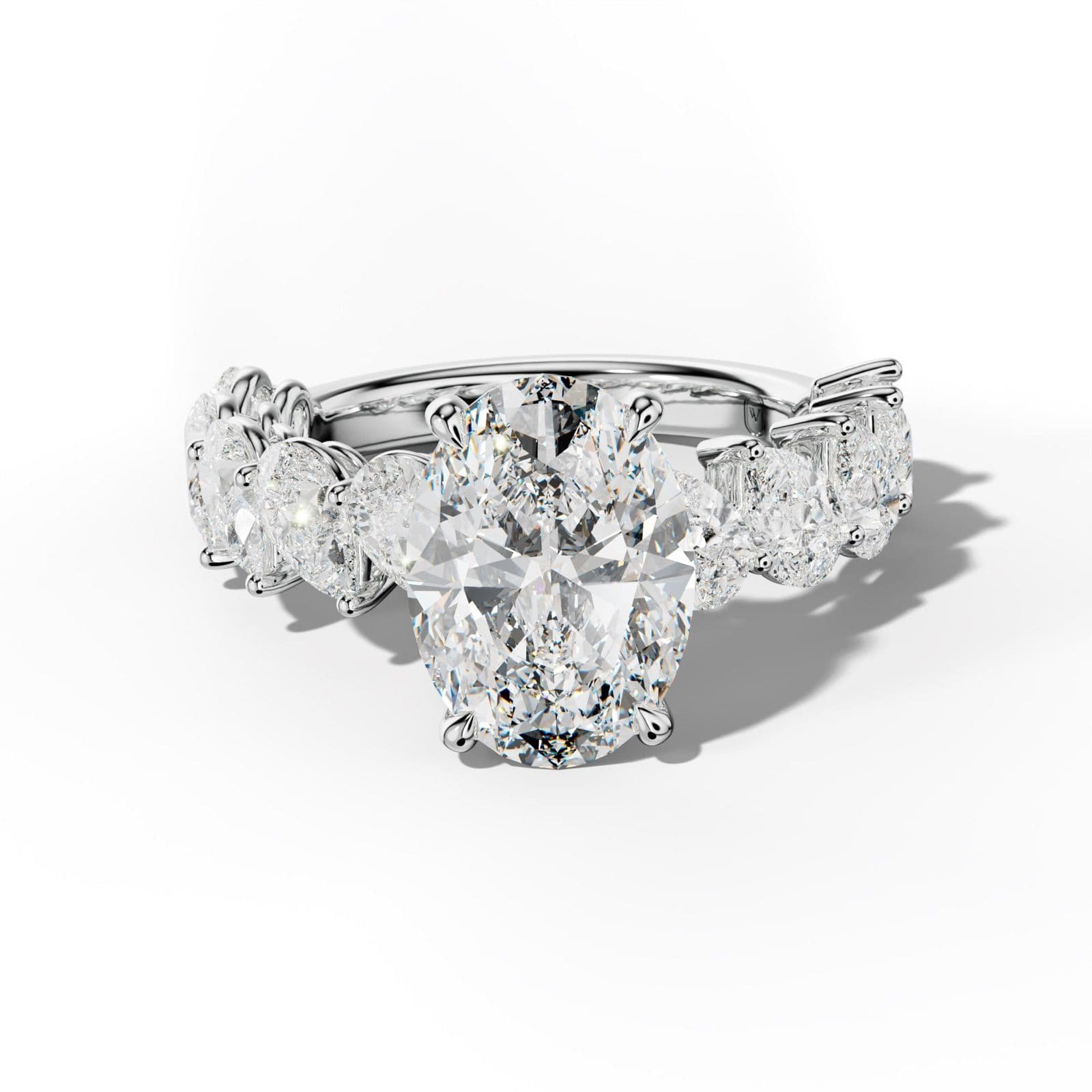 Elisabeth Oval Diamond Engagement Ring With Slanted Pear Side Stones