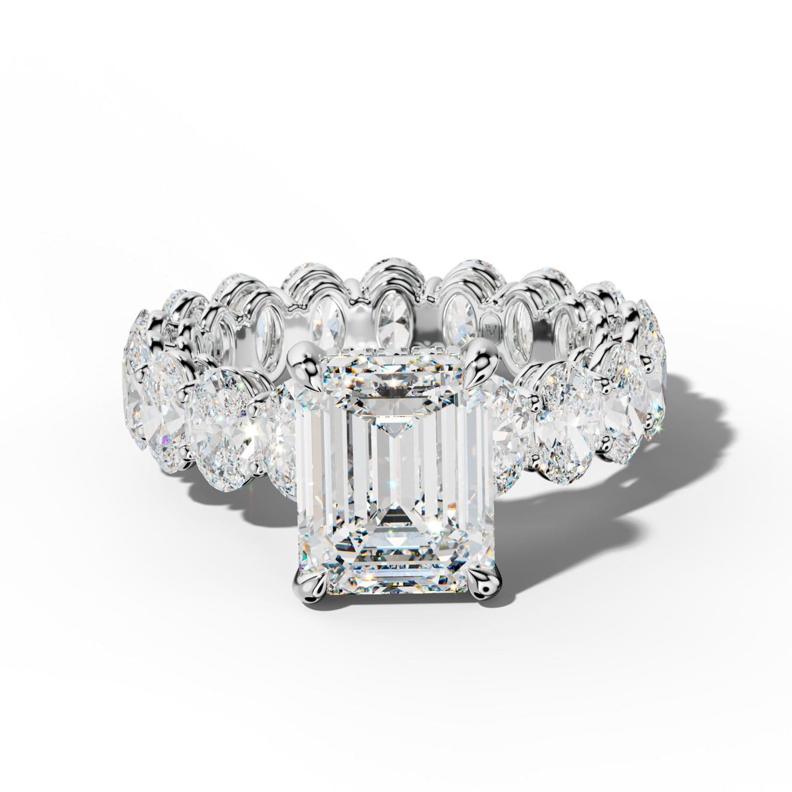 Amoura Emerald Cut Engagement Ring With Oval Side Stones